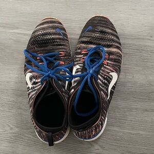 Nike Black and White Knit Sneakers with Blue Accents